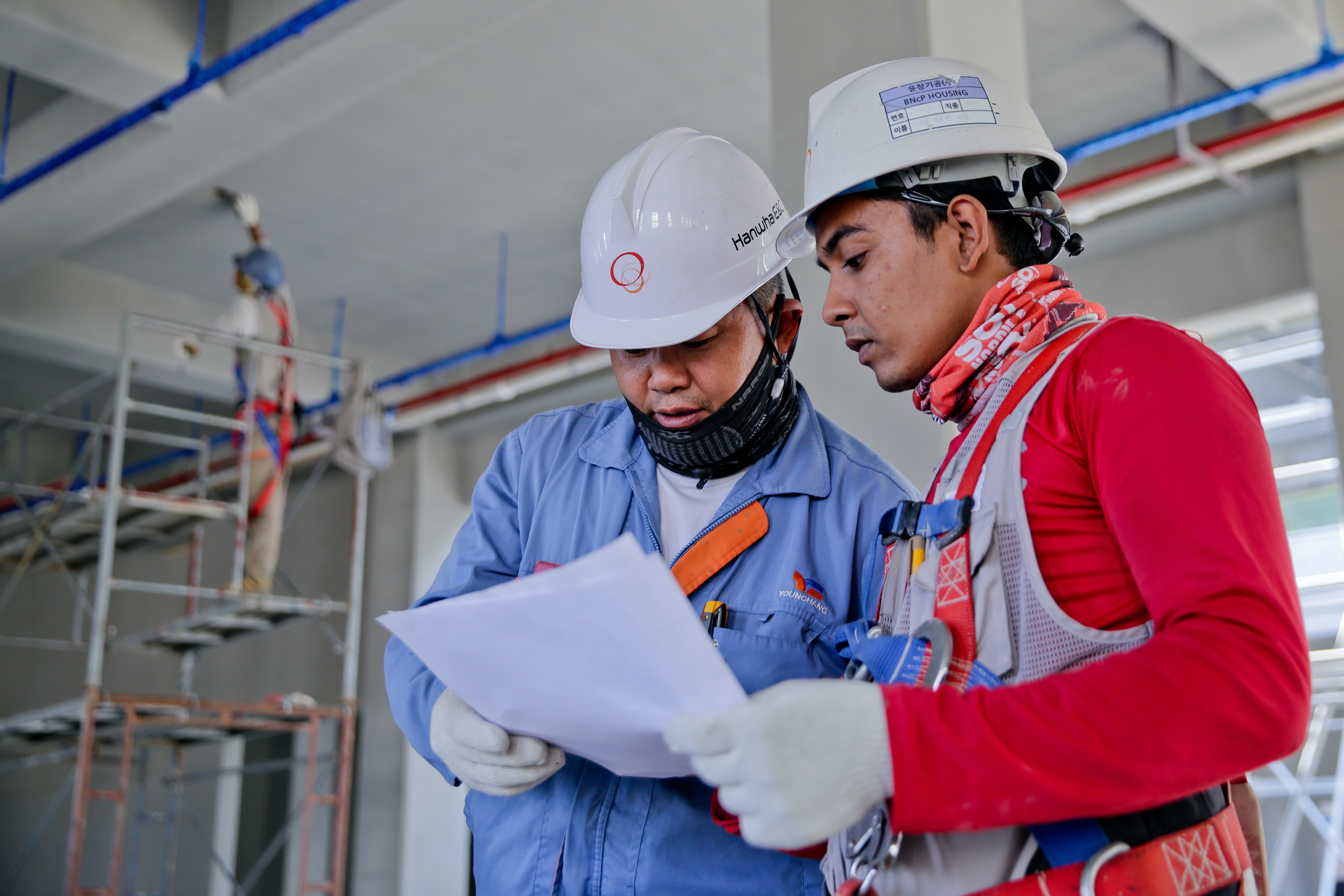 architect and engineer talking on a construction site